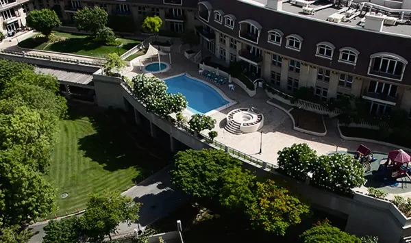 Uptown Mirdif residential buildings, landscaped courtyards and shared swimming pool